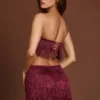 Maristella Fringed Mid-Rise Mini Skirt in Wine Red