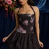 Nanala Halterneck Lace-Up Bubble Hem Mini Dress in Black Floral Print Nanala Halterneck Lace-Up Bubble Hem Mini Dress in Black Floral Print