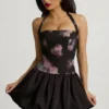 Nanala Halterneck Lace-Up Bubble Hem Mini Dress in Black Floral Print Nanala Halterneck Lace-Up Bubble Hem Mini Dress in Black Floral Print