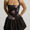 Nanala Halterneck Lace-Up Bubble Hem Mini Dress in Black Floral Print Nanala Halterneck Lace-Up Bubble Hem Mini Dress in Black Floral Print